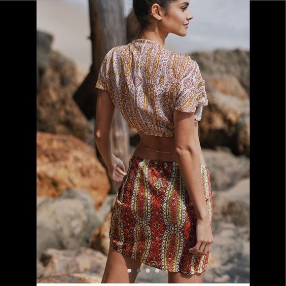 Two-Piece Twist Top and Wrap Skirt Set
Anthropologie - Picture 3 of 4